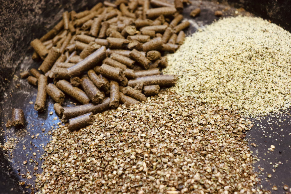 Hemp seed hulls and pellets in a horse feed dish